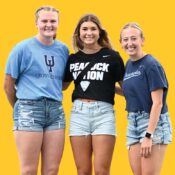 Three happy UIU students pose for a photo